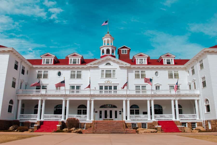 From Denver: Rocky Mountain National Park Day Trip and Lunch - Estes Park and the Stanley Hotel: two very different kinds of famous